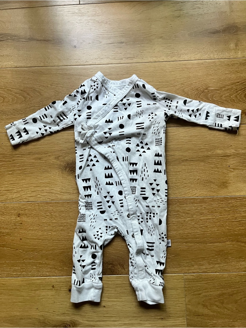 The Honest Company White One-Piece with Black Geometric Print
